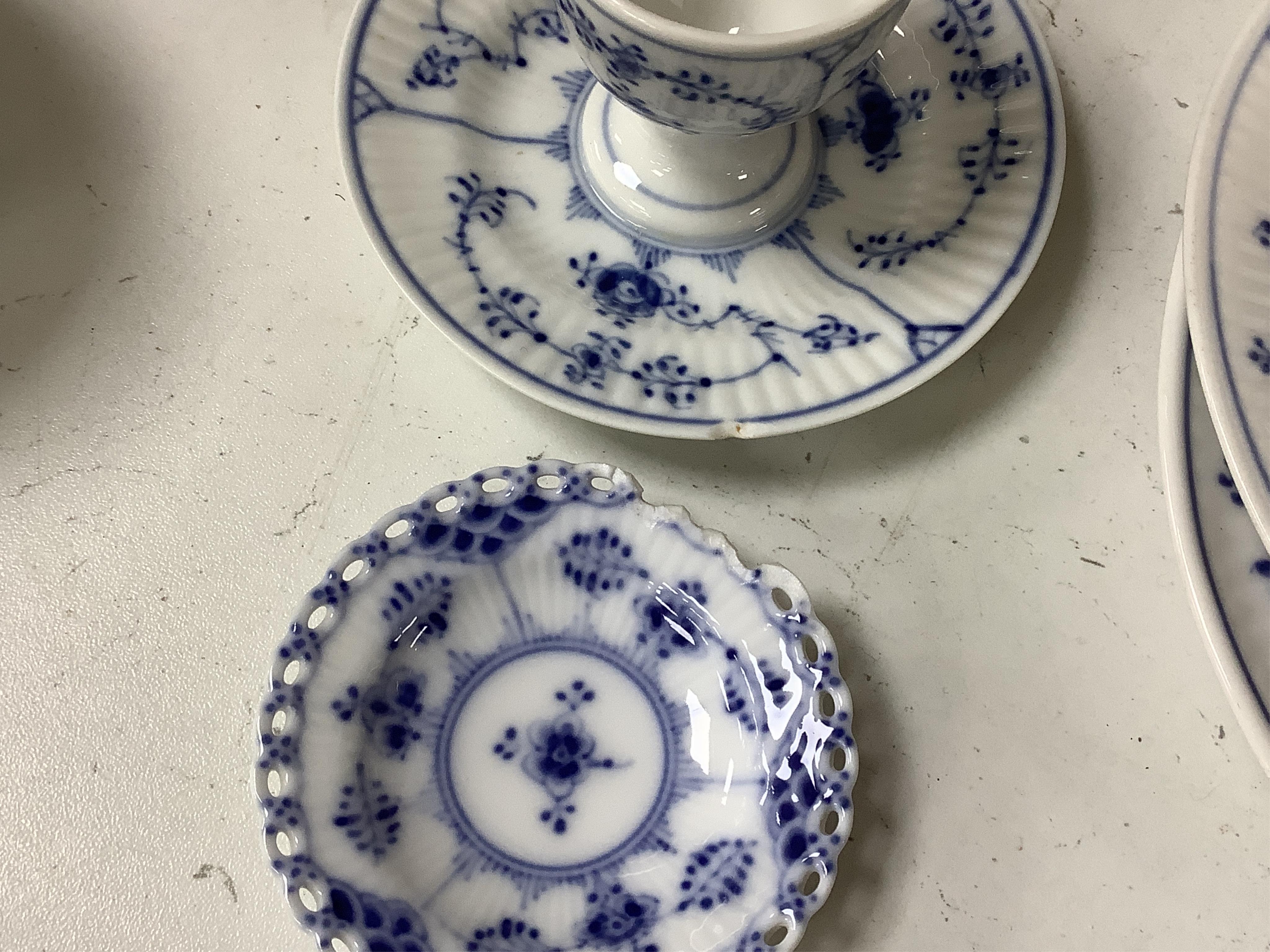 A collection of Royal Copenhagen and Bing & Grondahl onion pattern blue and white tableware